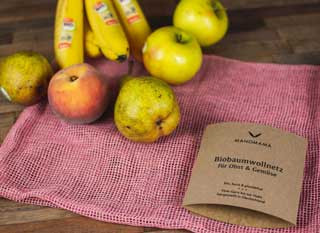 nachhaltige Verpackung: Bio Baumwollnetz mit Äpfeln, Birnen und Bananen