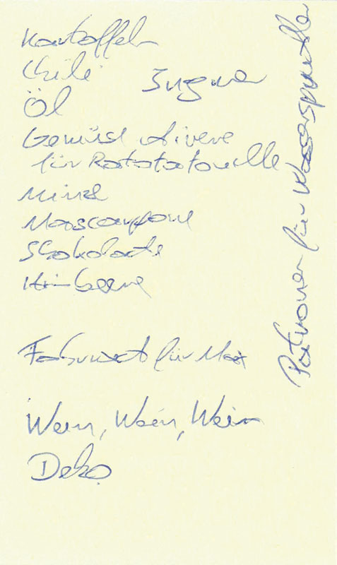Gelber Zettel mit handschriftlichem Text
